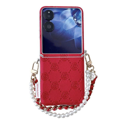 Red embossed rose phone case with side buckle and pearl beaded bracelet strap