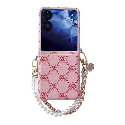 Pink embossed rose phone case with side buckle and pearl-bead bracelet strap