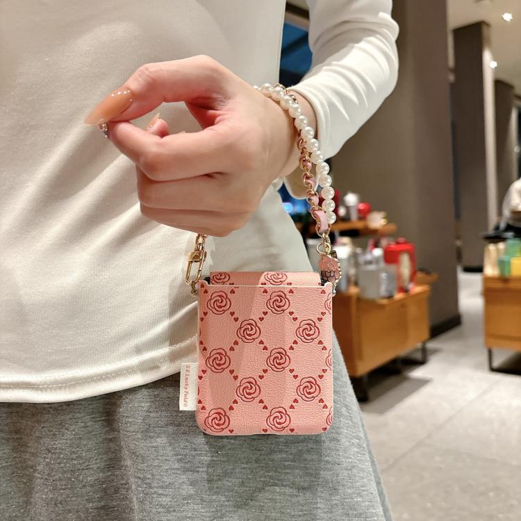 Pink embossed rose phone case with side buckle and pearl-bead chain bracelet