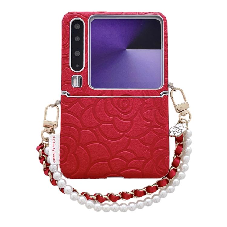 Red embossed camellia phone case with side buckle and pearl chain shoulder strap