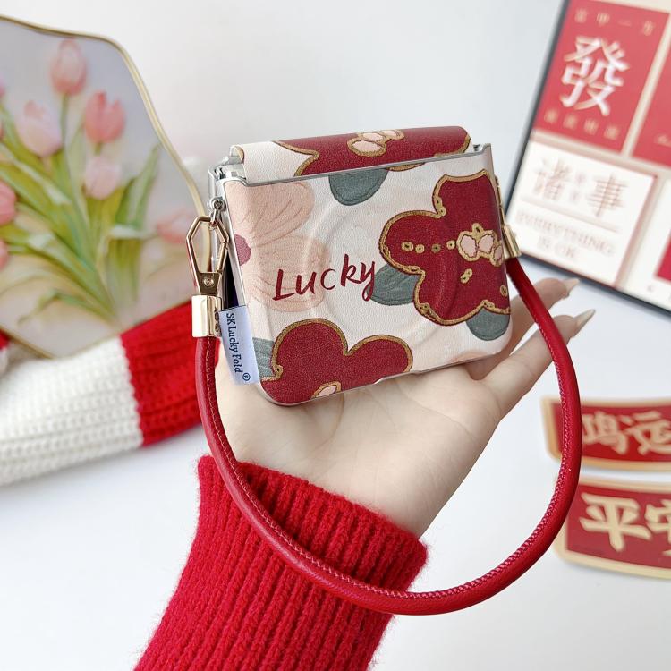 Lucky dog print phone case with wrist strap, front flap, and metal clasp