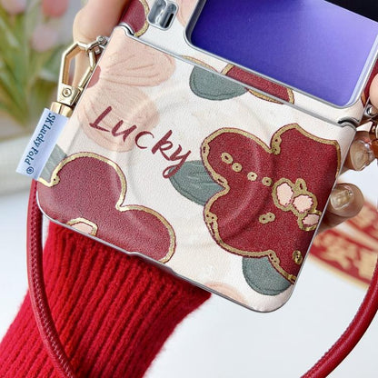 Lucky dog print phone case with wrist strap and silver-tone frame edge