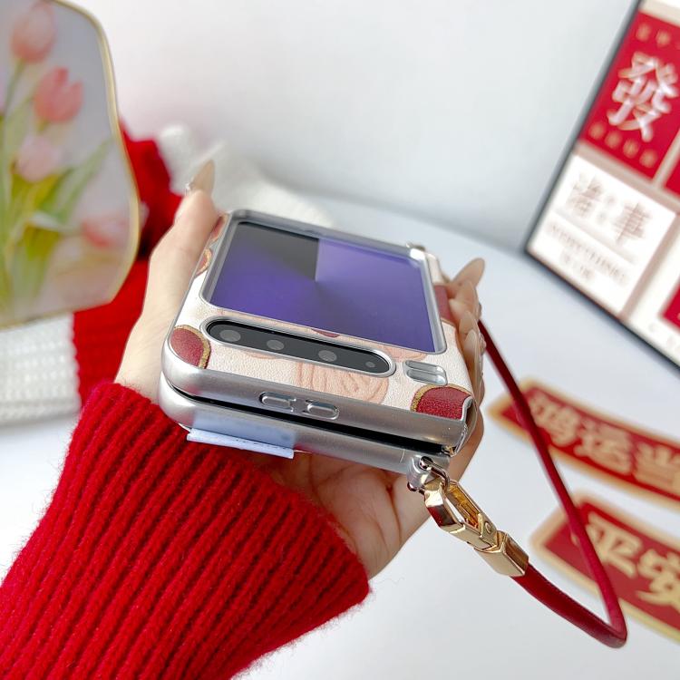Silver-tone phone case with lucky dog print back and wrist strap metal clasp