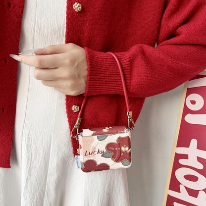 Lucky dog print phone case with wrist strap and metal clasp