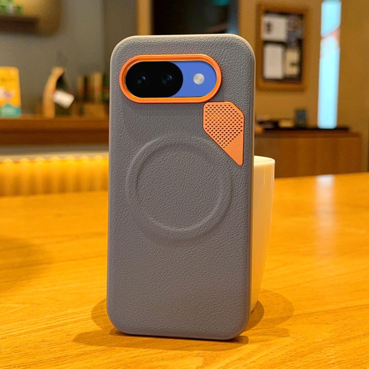 Light gray phone case with orange trim and perforated cooling panel, textured finish