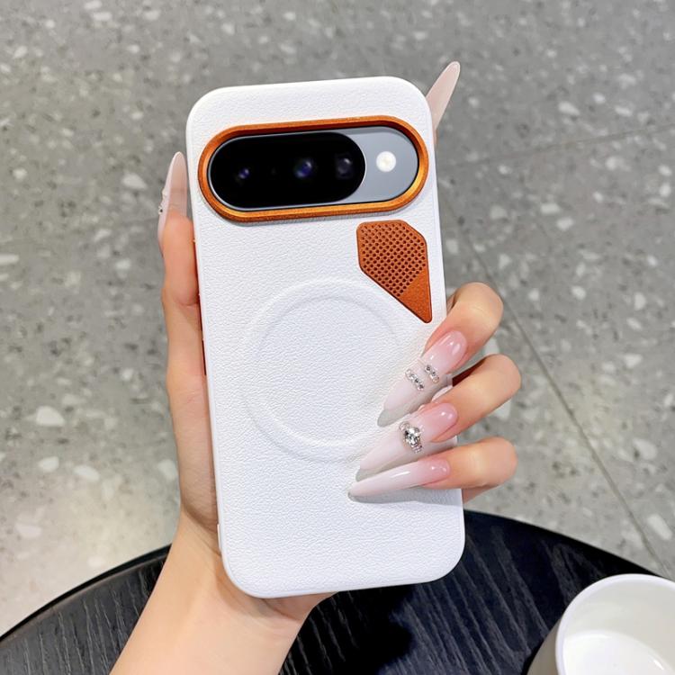 White MagSafe phone case with orange trim, circular grip design, and cooling hole panel