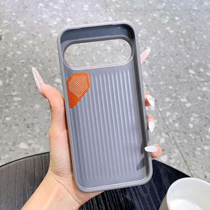 Gray MagSafe phone case with orange cooling hole insert and textured back