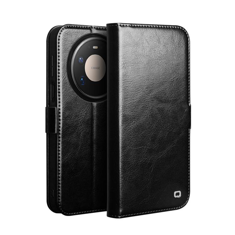 Black leather flip phone case with buckle strap; camera cutout visible