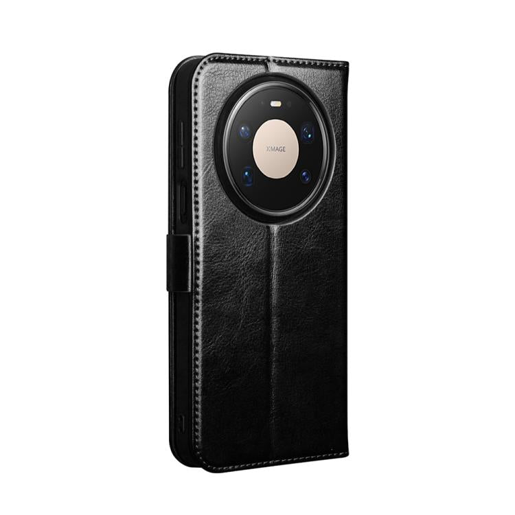 Black leather wallet phone case with camera cutout and fold-over cover