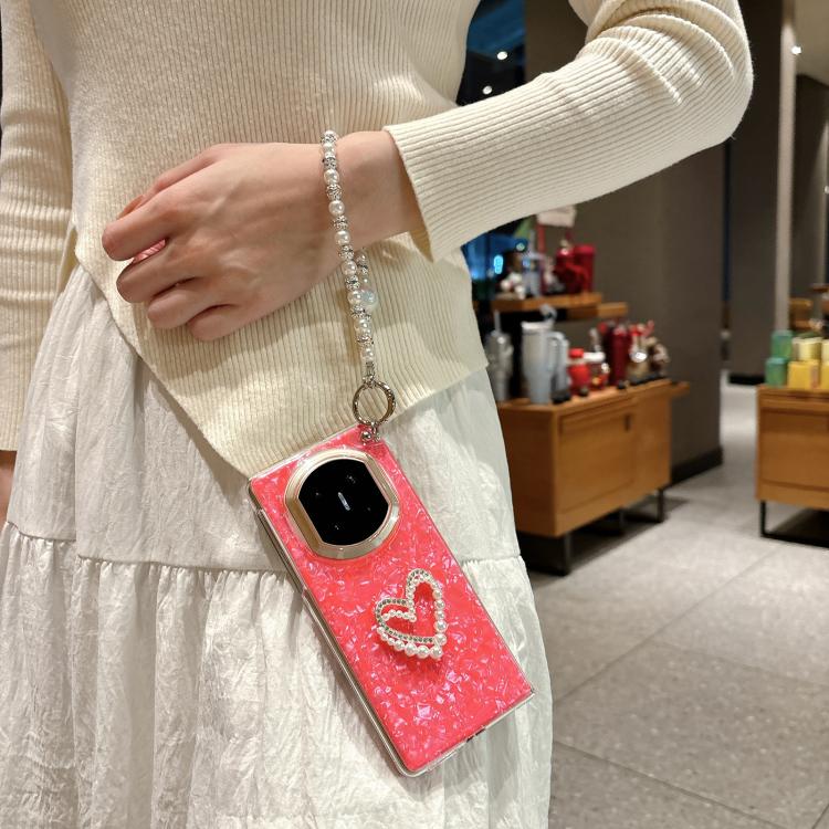 Red shell-pattern phone case with rhinestone heart and pearl beaded love bracelet