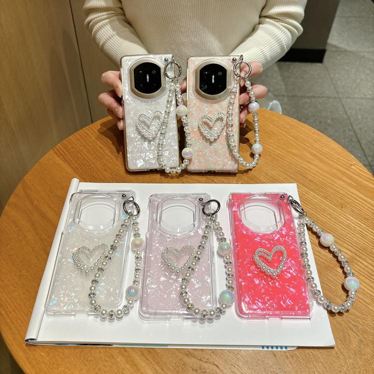 Set of three phone cases with heart designs and pearl beaded love bracelets