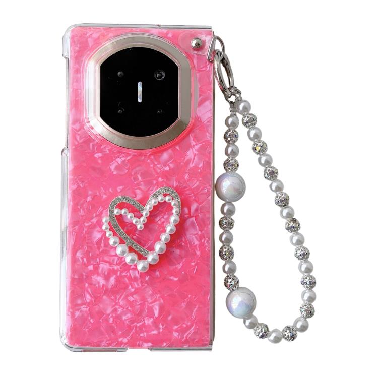 Pink shell-pattern phone case with heart charm and beaded wrist strap