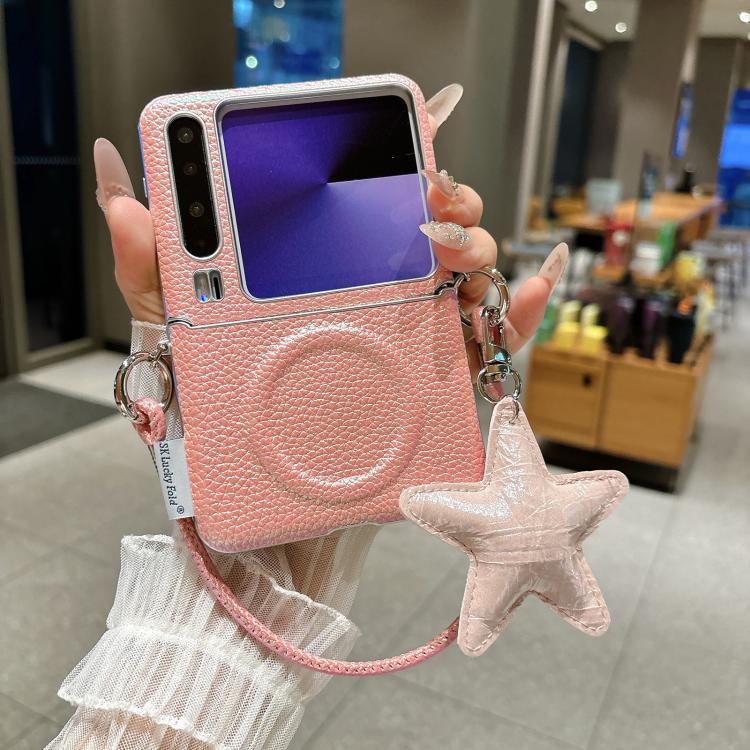 Pink textured phone case with silver trim, magnetic side buckle, and star charm wrist strap