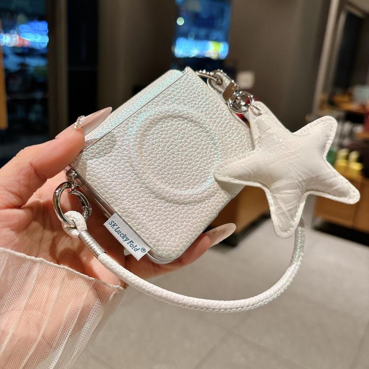 White textured phone case with silver edge, side buckle, and star charm wrist strap