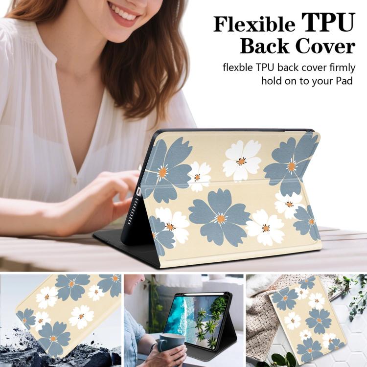 Vegan leather tablet case with blue-and-white daisy floral print, holding tablet upright