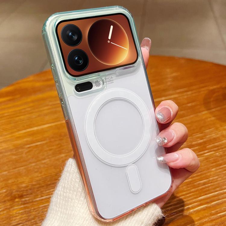 Transparent phone case with teal trim, white magnetic ring pad, and camera module cutouts