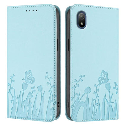 Light blue folio phone case with tulip and butterfly pattern, side and back view