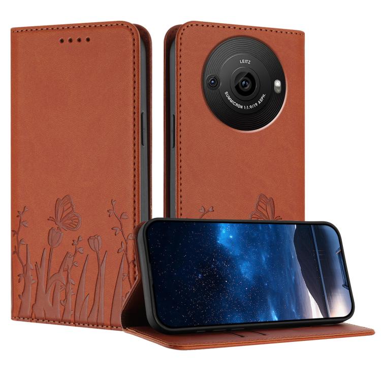 Orange vegan leather phone case with tulip and butterfly line art, magnetic folio style