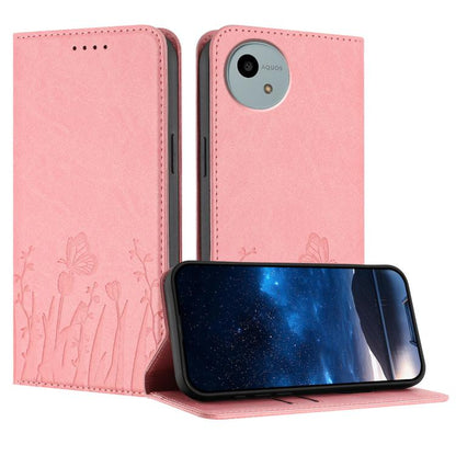 Magnetic vegan leather phone case in pink with tulip and butterfly pattern, folio flap
