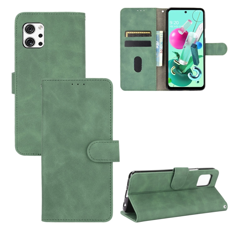Green PU leather flip phone case with magnetic buckle and card slots, wallet-style folio.