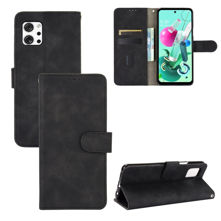 Black PU leather flip phone case with magnetic buckle and card slots, wallet-style folio.