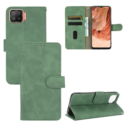 Dark green PU leather flip phone case with magnetic buckle and card slots, wallet-style folio.