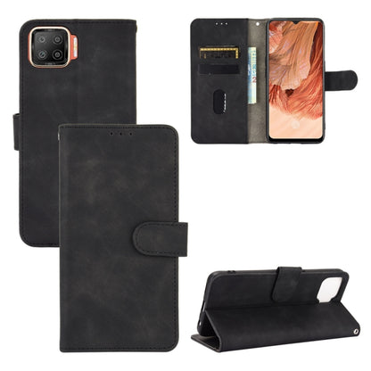 Black PU leather flip phone case with magnetic buckle and card slots, wallet-style folio.