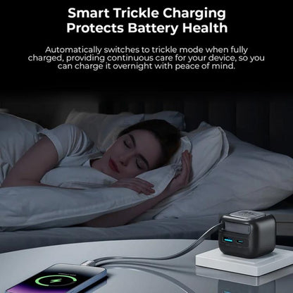 GaN travel charger with connected cable and glowing status indicator on a tabletop
