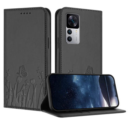 Black magnetic phone case with tulip and butterfly emboss pattern, flip cover with camera opening