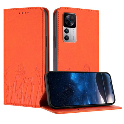 Orange magnetic phone case with tulip and butterfly emboss pattern, flip cover with camera opening