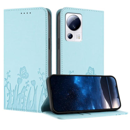 Light blue magnetic vegan leather phone case with butterfly and flower pattern, flip stand