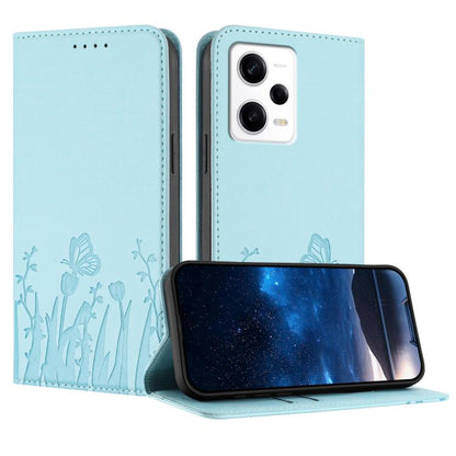 Light blue magnetic vegan leather phone case with tulip and butterfly pattern, folio cover.