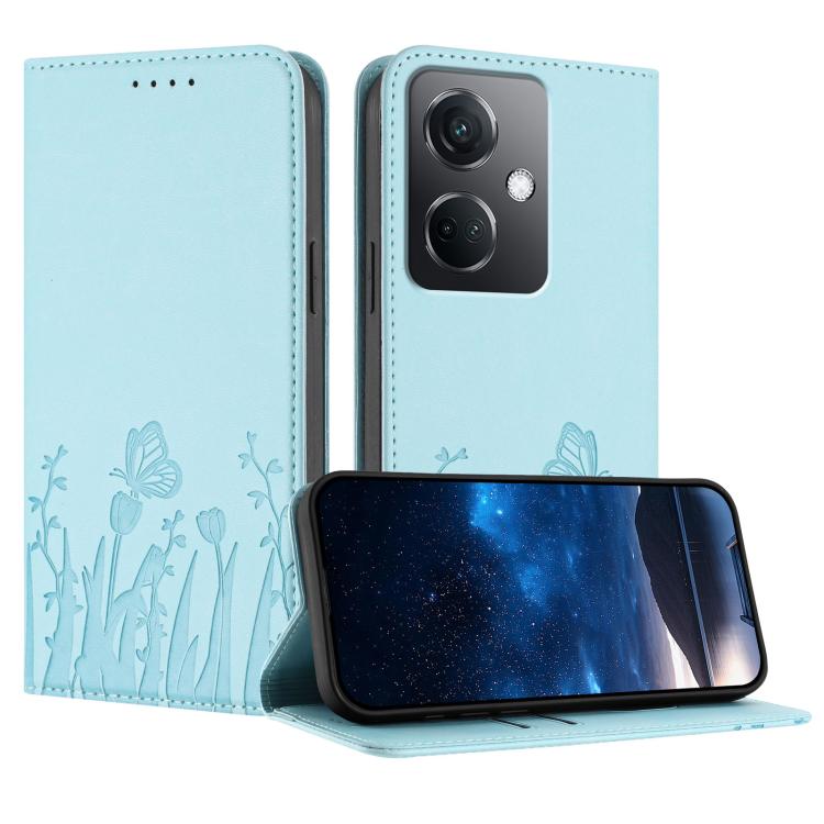 Magnetic vegan leather phone case in light blue with tulip and butterfly pattern.