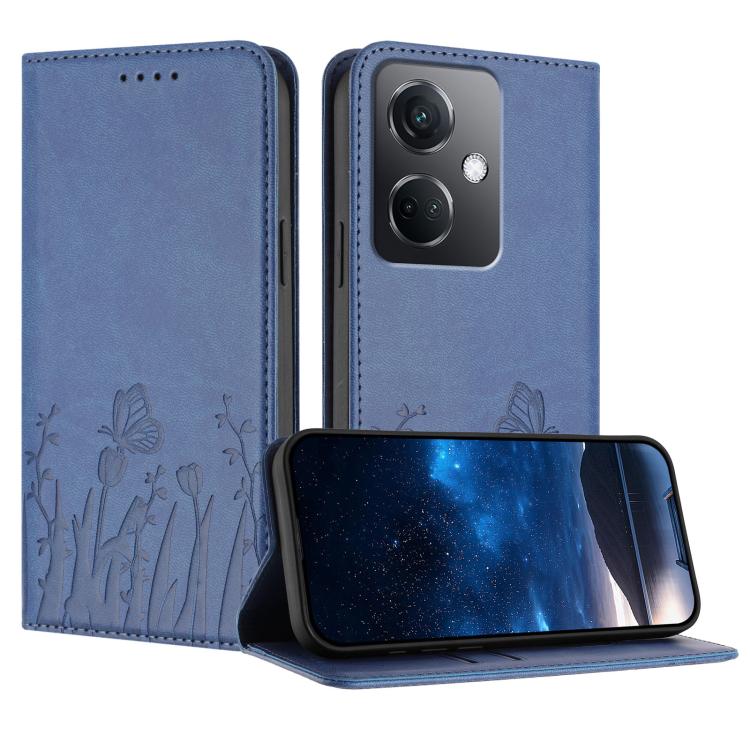 Magnetic vegan leather phone case in medium blue with tulip and butterfly pattern.