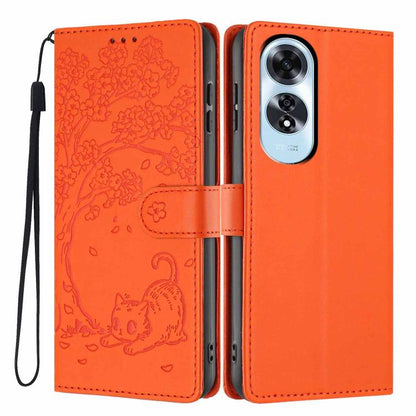 Orange flip phone case with embossed cat artwork, wrist strap, and camera cutout
