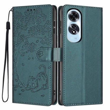 Teal embossed cat flip phone case with camera cutout and attached wrist strap