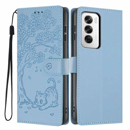Light blue flip phone case with embossed cat pattern, wrist strap, and camera cutout