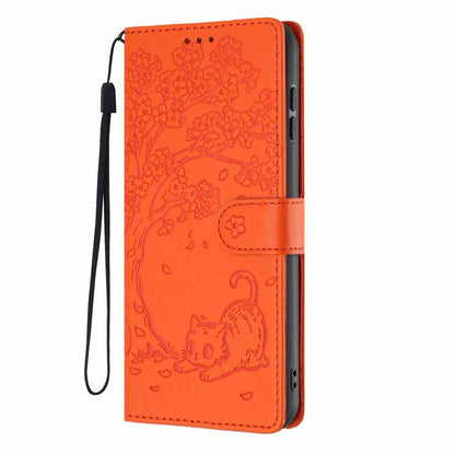Orange flip phone case with embossed cat pattern and side camera cutouts, wrist strap.
