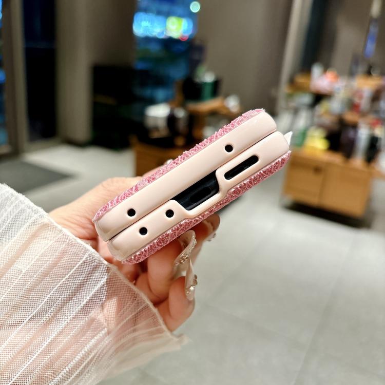 Pink lace-embossed phone case side view with beaded wrist strap