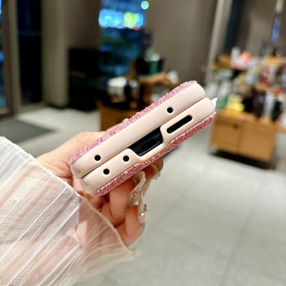 Pink lace-embossed phone case side view with beaded wrist strap