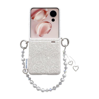White lace-embossed phone case with dual metal hooks and pearl wrist strap, heart charms