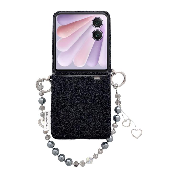 Black embossed phone case with dual metal hooks and pearl bead wrist strap