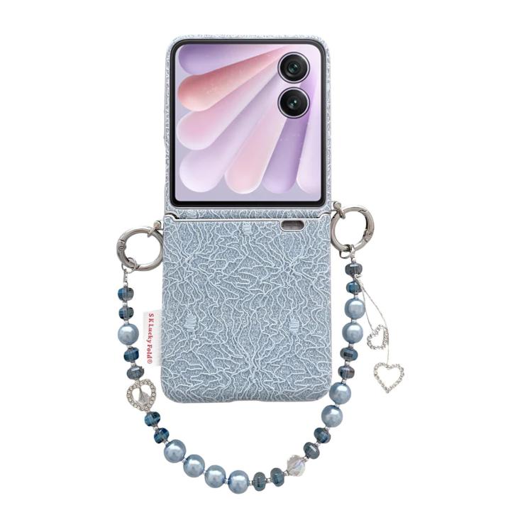 Light blue embossed phone case with dual metal hooks and pearl bead wrist strap