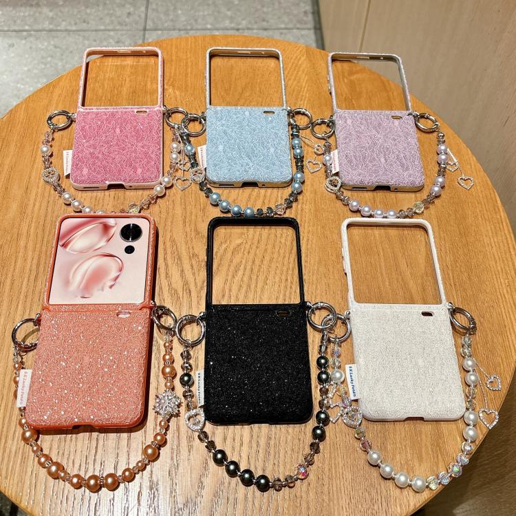 Assorted lace-embossed phone cases with metal hooks and beaded wrist straps, mixed colors
