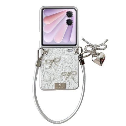 Silver scale-texture bow phone case with wrist strap and heart charm