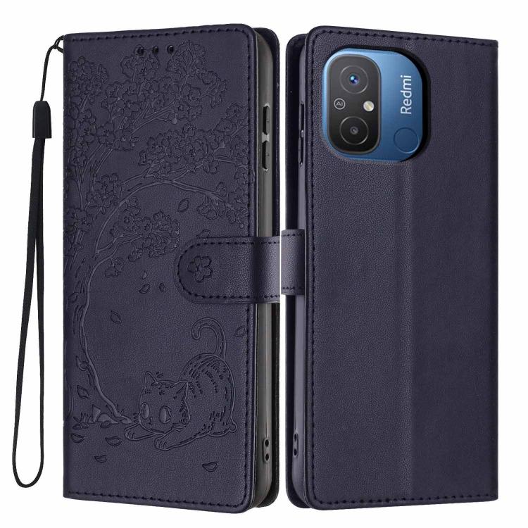 Tree-cat embossed vegan leather flip phone case with wrist strap, deep navy blue.