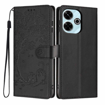 Black embossed tree cat flip vegan leather phone case with wrist strap and camera cutouts