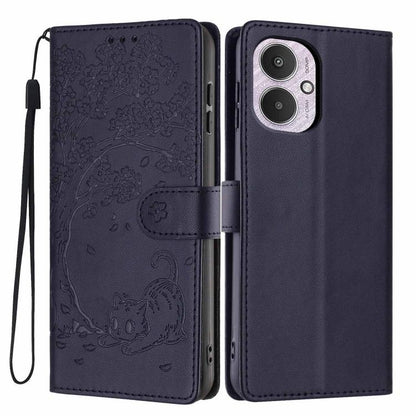 Dark blue flip vegan leather phone case with embossed tree cat, wrist strap, camera cutout.