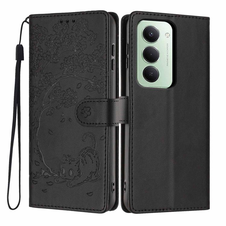 Black embossed flip vegan leather phone case with cat tree design and wrist strap.