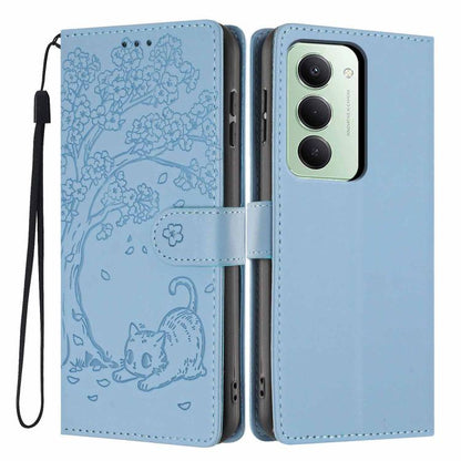 Light blue embossed tree-and-cat flip phone case with vegan leather and wrist strap